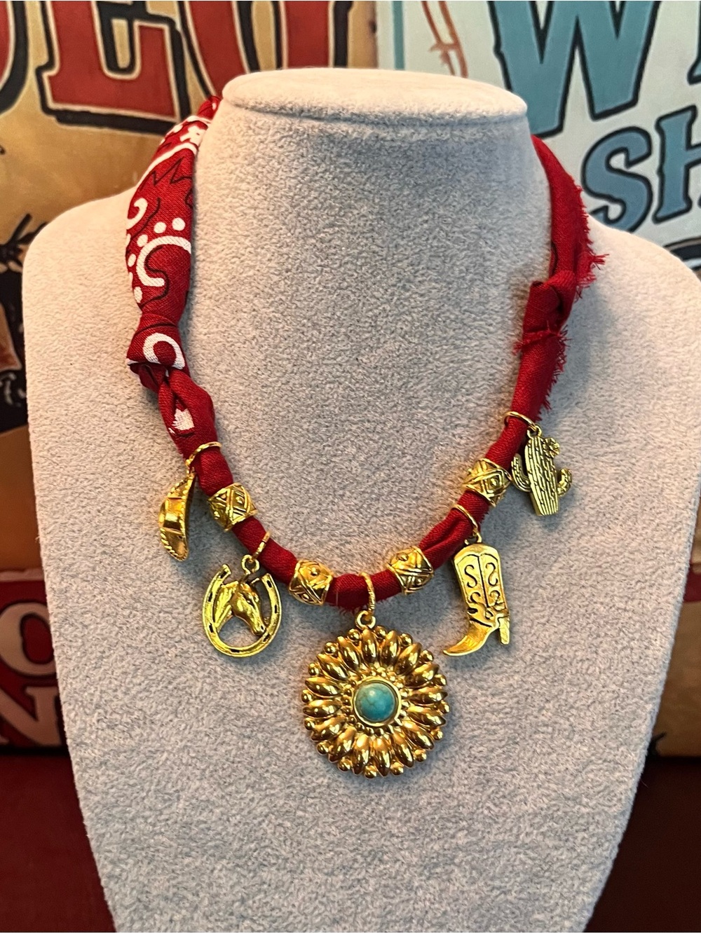 Bohemian Gold-Tone Sunburst Pendant Necklace on a Red Bandana
